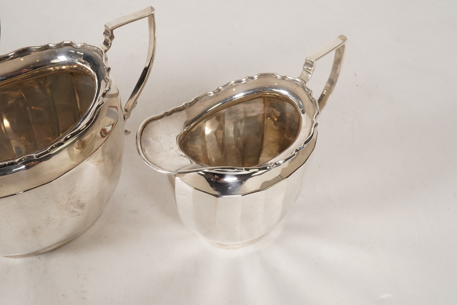 A George V silver three piece tea set by William Devonport